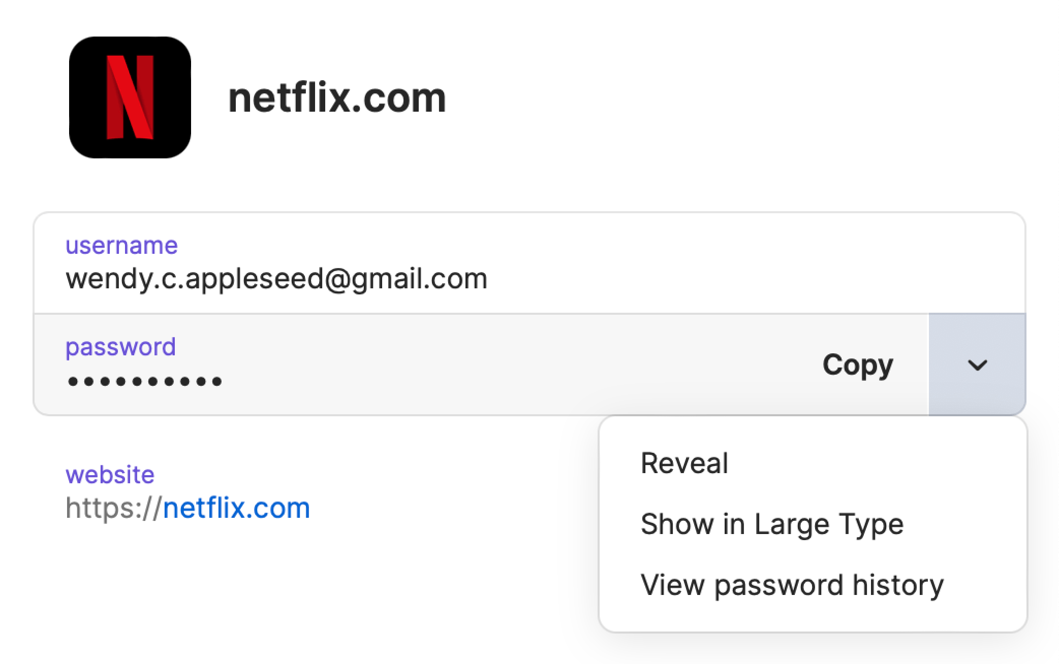 A Login item on 1Password.com with the Reveal and Show in Large Type dropdown shown